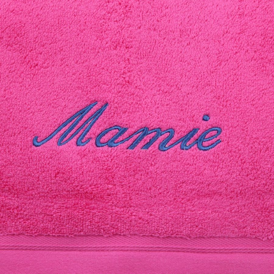 serviette fuchsia brodée bleu